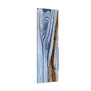 May include: Abstract painting with swirling blue, gray, and black lines and a vertical stripe of orange and brown.