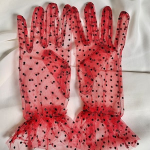 Sheer red gloves with black polka dots. Weddings gifts parties props costumes photography crafts styling