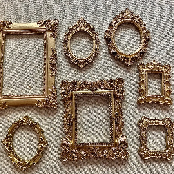 Read description.Smaller frames.Handmade antique style resin frames.7 pieces Gold. Photography props  flat lay crafts wedding decor access