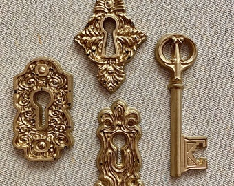 Lock and key set. Resin. Handmade. Antique gold. Ornate. Photography props styling wedding parties crafts decor flat lays