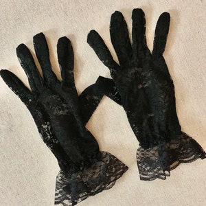 Black lace gloves. Weddings props costumes party gifts styling photography.