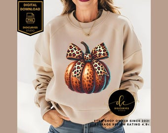 May include: A beige sweatshirt with a graphic of a pumpkin with a leopard print bow. The text "Etsy Shop Owner Since 2021 Average Review Rating 4.8+" is printed on the bottom of the sweatshirt.