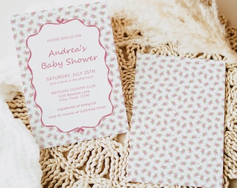 May include: Baby shower invitation with a pink floral pattern and text. The invitation reads "Andrea's Baby Shower" with event details. A matching card with the same floral pattern is also present.