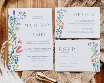 Könnte beinhalten: Hochzeitseinladungs-Set mit floralen Aquarelldesigns. Das Set beinhaltet eine Einladung, eine Detailkarte und eine RSVP-Karte. Die Einladung zeigt die Namen "Mary Ann und Daniel" und das Hochzeitsdatum, 15. September 2026.