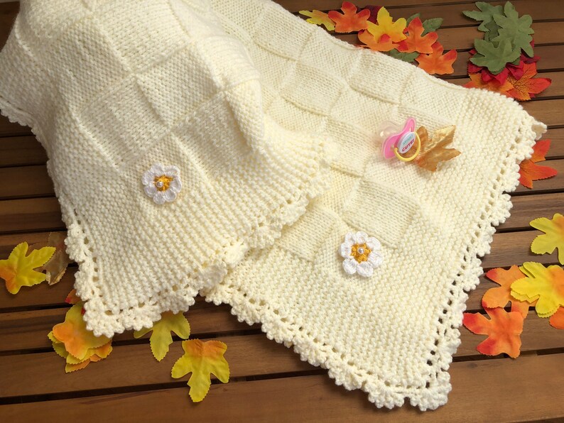 Knitted Light Yellow Baby Blanket With Crochet Flower on Each Corner