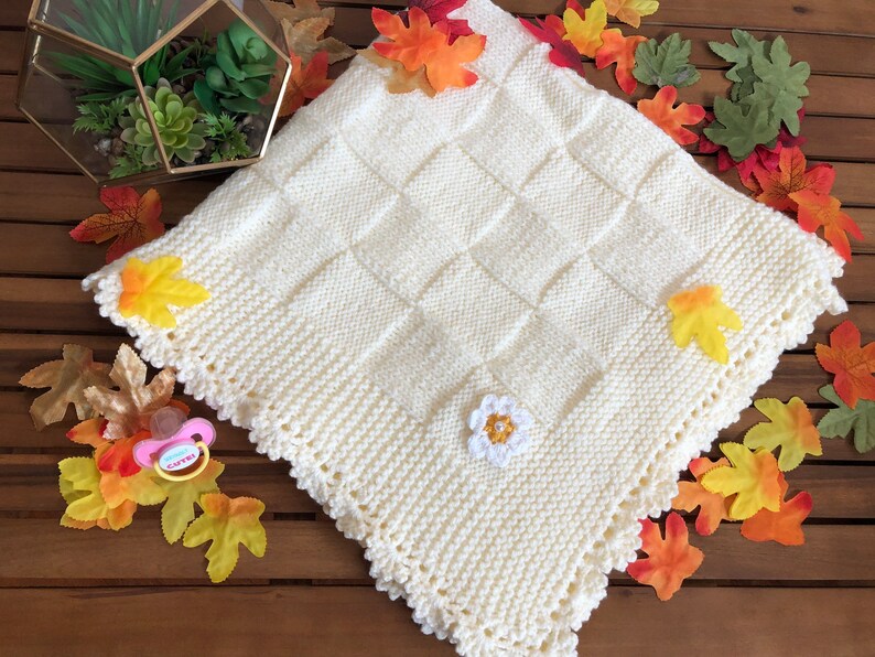 Knitted Light Yellow Baby Blanket With Crochet Flower on Each Corner