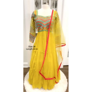 On sale yellow Long Sleeves Gown with embroidery work on yoke and back Ready to ship size 38.