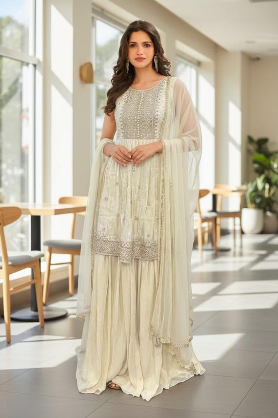 white and gold sharara dress Elegant off-white rich silk set with delicate sequin detailing for that royal glow size 40 Partywear pakistani golden sharara suit