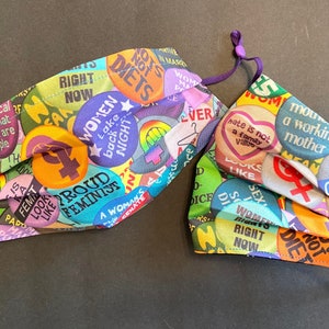Masque facial boutons féministes