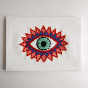 Evil Eye Punch Needle Art: Handmade Fiber & Beadwork Wall Hanging