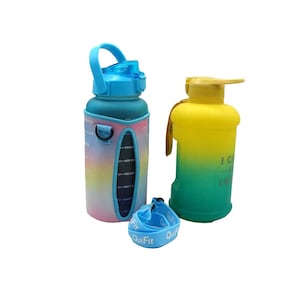 May include: Two water bottles with a blue and green ombre design. The bottle on the left has a rainbow pattern and a blue strap. The bottle on the right is yellow with a green ombre design. Both bottles have a carrying strap.