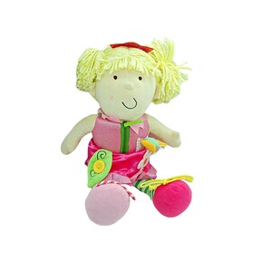 May include: A soft plush doll with blonde yarn hair tied with a red bow. The doll wears a pink dress with green and yellow accents, and has pink and green striped legs. The doll has a smiling face and is sitting down.