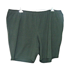 May include: Dark green cotton shorts with an elastic waistband.