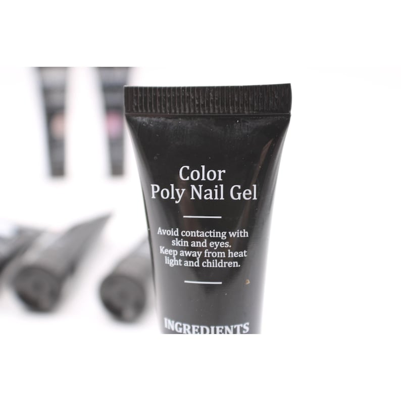 May include: A black tube of Color Poly Nail Gel. The tube has white text that reads "Avoid contacting with skin and eyes. Keep away from heat light and children." The word "INGREDIENTS" is also printed on the tube.