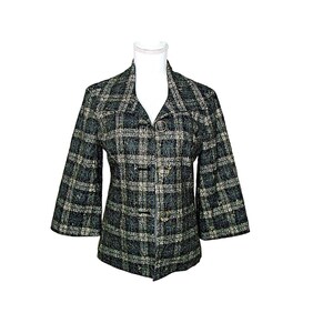 May include: A green, black, and white plaid blazer with three-quarter sleeves. The blazer has a notched collar and is fastened with three gold-colored buttons. The jacket is displayed on a white mannequin.