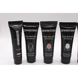 May include: A selection of black tubes of nail extension gel. The tubes are labelled with the brand names "VANSISOS" and "JEWHITENY". Each tube contains 15ml of product. The tubes are labelled with the product name, colour, and other details.