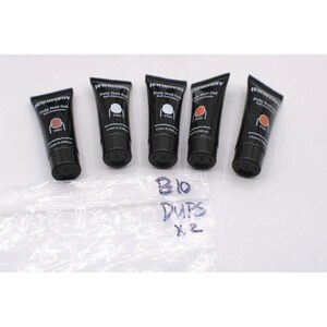 May include: Five black tubes of JEWHITENY Poly Nail Gel, each containing a different shade of gel. The tubes are labelled with product codes and volume information. A clear plastic bag with handwritten text is in the foreground.