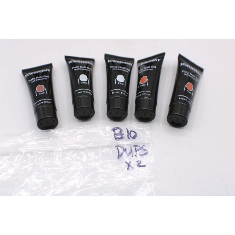 May include: Five black tubes of JEWHITENY Poly Nail Gel, each containing a different shade of gel. The tubes are labelled with product codes and volume information. A clear plastic bag with handwritten text is in the foreground.