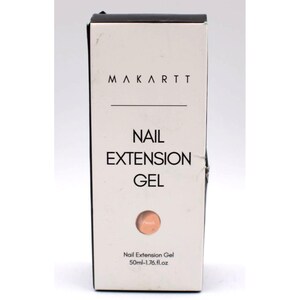 Op de afbeelding: Een witte doos met Makartt Nail Extension Gel. De doos heeft zwarte tekst met de tekst "Makartt", "Nail Extension Gel" en "Peach". De doos heeft ook een perzikkleurige cirkel en de tekst "50ml-1.76 fl.oz".