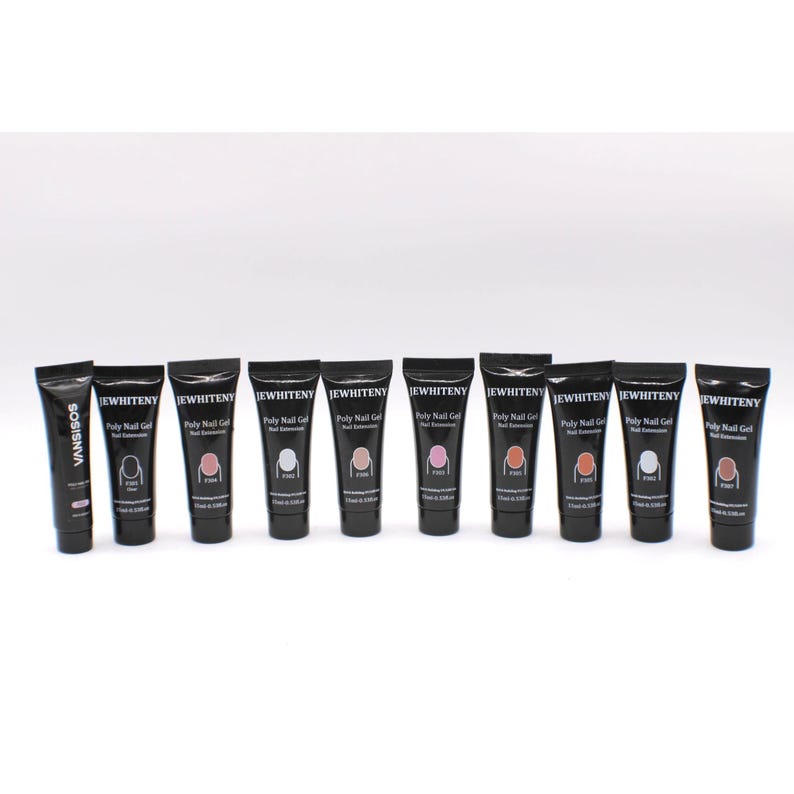 May include: A selection of black tubes of nail extension gel, each with a different shade of pink, white, and nude. The tubes are labelled "JEWHITENY Poly Nail Gel" and "VANSISOS". The tubes are arranged in a row.