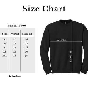 May include: Black Gildan 18000 sweatshirt with a size chart. The chart shows measurements in inches for sizes S to 2XL. The width measurements range from 20 to 28 inches, and the length measurements range from 26 to 30 inches.