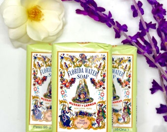 May include: Three bars of Florida Water Soap, each wrapped in a green and white box with a floral design. The boxes feature the text "Florida Water Soap" and "Murray & Lanman New York, Peru". The soap is 3.35 ounces.