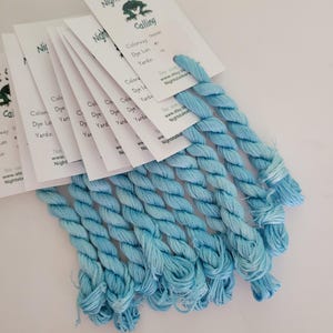 May include: A rustic wooden sign with the text "Welcome to our home" in white lettering. The sign features a distressed finish and a simple, inviting design, perfect for entryway decor.