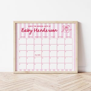 May include: A framed pink and white striped calendar with the text "Guess the arrival date of Baby Henderson." The calendar has a grid for marking dates and a space for the due date. A bow and cherry graphic is in the top right corner.