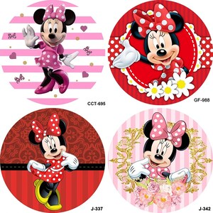 May include: Four different designs of Minnie Mouse round stickers. Each sticker features Minnie Mouse in a red and white polka dot dress with a red bow. The backgrounds are different: pink and white stripes, red with white daisies, red and white stripes with a red and gold design, and pink and white stripes with pink flowers.