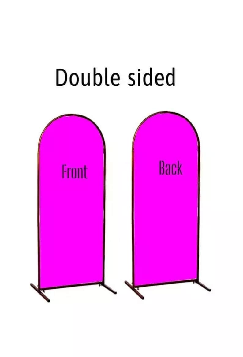 May include: Double-sided freestanding display stand with a pink fabric backdrop. The front side is labeled "Front" and the back side is labeled "Back".
