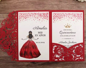 May include: Red Quinceañera invitation with a laser-cut floral design. The invitation features the name "Amelia" and the text "MIS XV AÑOS" with a drawing of a girl in a red dress. The invitation also includes the text "Join us for a Quinceañera Celebration".