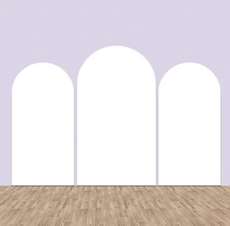 May include: Three white arches against a light purple wall with a wood floor.