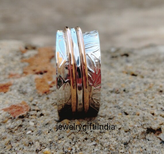 Spin Band Ring with Tri Tone Bands Yellow and Rose Gold Over Sterling Silver Spin Band Ring with Tri Tone Bands Yellow and Rose Gold Over Sterling Silver