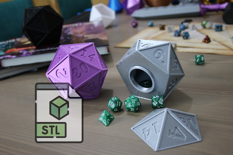 May include: A purple and a gray 20-sided dice with a hole in the top of the gray dice. There are several green dice on the table. The dice are printed with numbers. The image also shows a file icon with the text "STL" on it.