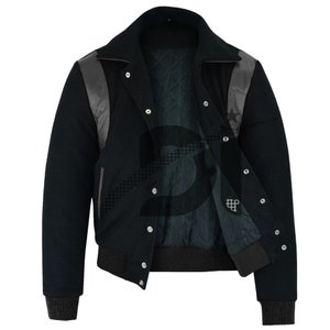 May include: A black varsity jacket with a leather collar and sleeves. The jacket has a quilted lining and a snap closure.