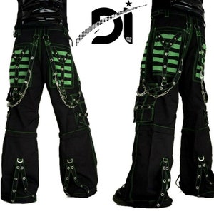 May include: Black cargo pants with green trim and multiple straps and buckles. The pants have a chain detail and a large pocket on each leg.