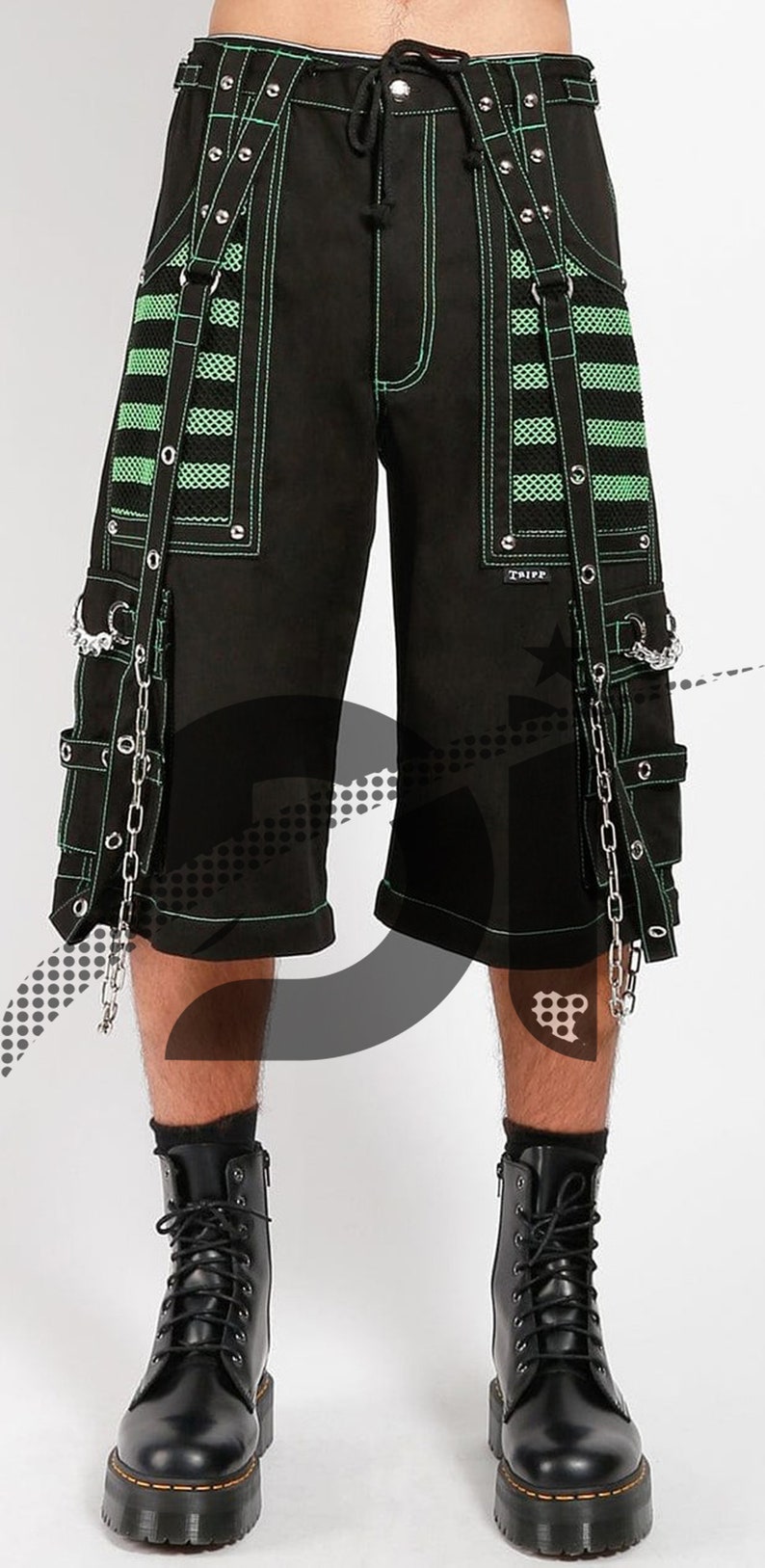May include: Black cargo shorts with green and white striped panels, featuring multiple straps and silver chains. The shorts have a drawstring waist and are accented with silver hardware.
