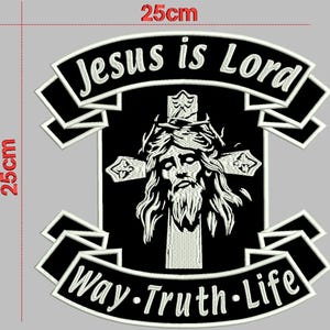 May include: Embroidered patch depicting Jesus on a cross, with the text "Jesus is Lord" and "Way Truth Life". The patch is black and white, measuring 25cm (9.8 inches) square.