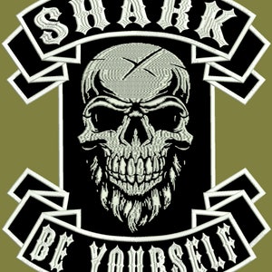 May include: Black and white embroidered patch with a skull and crossbones design. The patch has white text that reads "SHARK" and "BE YOURSELF".