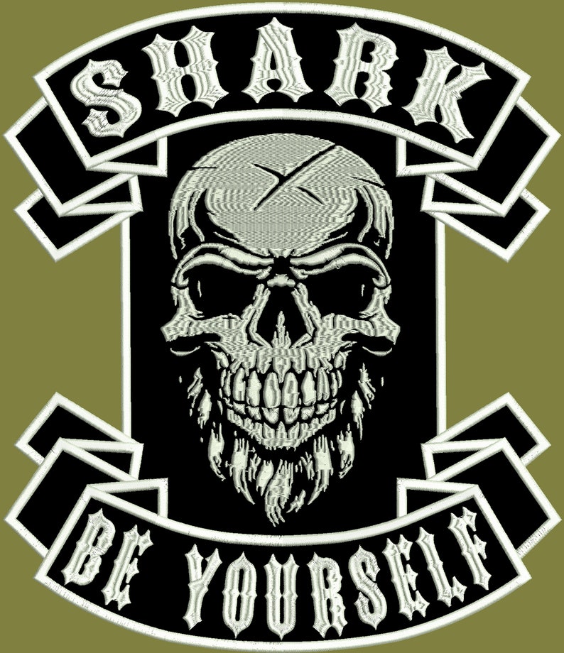 May include: Black and white embroidered patch with a skull and crossbones design. The patch has white text that reads "SHARK" and "BE YOURSELF".
