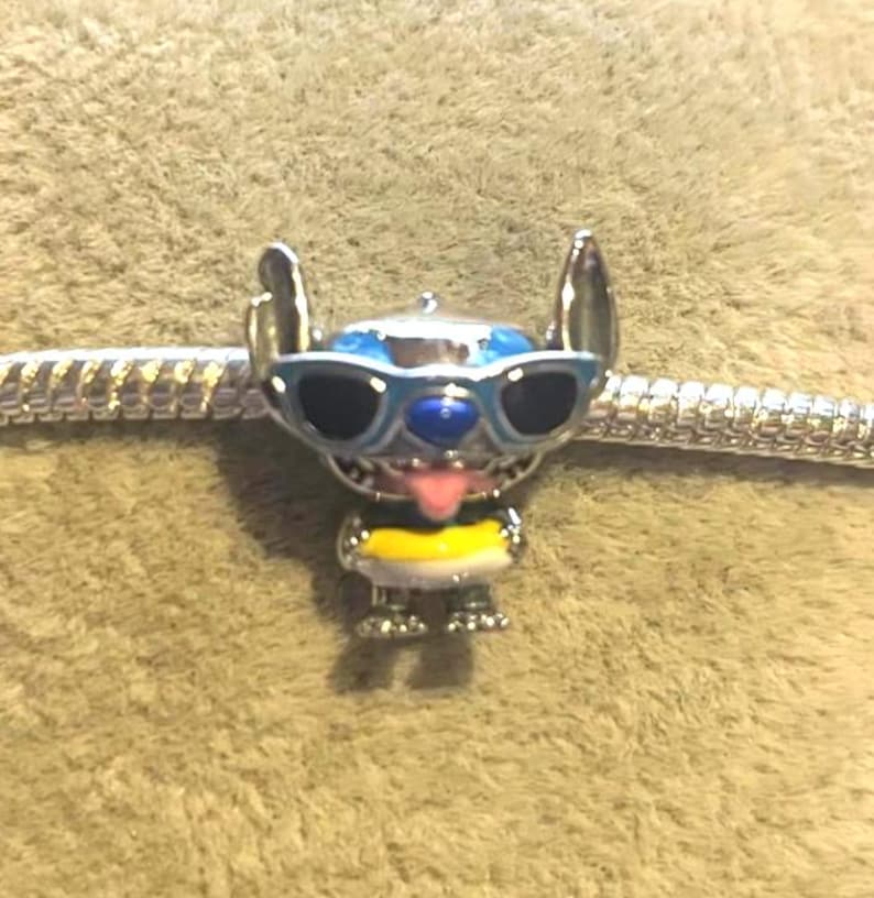 Sterling Silver Stitch pool float Charm ,Lilo & Stitch , Cartoon Charm , Charm for Bracelets , 925 Sterling Silver , gift for her image 1