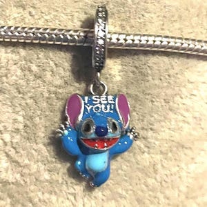 May include: A set of three ceramic mugs with a speckled, matte finish. The mugs are in shades of cream, light gray, and dark gray. Each mug has a simple, minimalist design, perfect for coffee or tea.