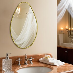 Irregular Oval Wall Mirror: Modern Wood Frame, Gold Accent