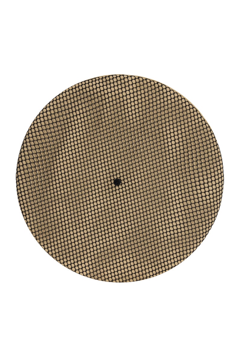 May include: A round, black and beige mesh plate with a small black dot in the center.
