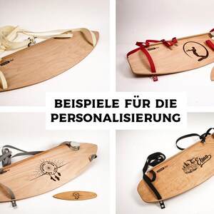 May include: Wooden balance boards with various designs and straps. The boards are light brown with black graphics and text. The text "BEISPIELE F&Uuml;R DIE PERSONALISIERUNG" is displayed in the center of the image.