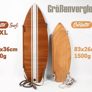 May include: Two wooden surfboards, one XL (43.3 x 14.2 inches) with white stripes and the other smaller (32.7 x 10.2 inches). The larger board weighs 4.4 pounds, and the smaller one weighs 3.3 pounds. The text "Carlotte Surf" is visible.