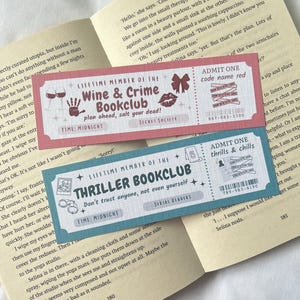May include: Two pink and blue ticket-style bookmarks with a vintage aesthetic. The top bookmark is for a "Wine & Crime Bookclub" with the text "Plan ahead, salt your dead!" and the bottom bookmark is for a "Thriller Bookclub" with the text "Don't trust anyone, not even yourself." Both bookmarks have a time of "Midnight" and a secret society or serial readers designation.