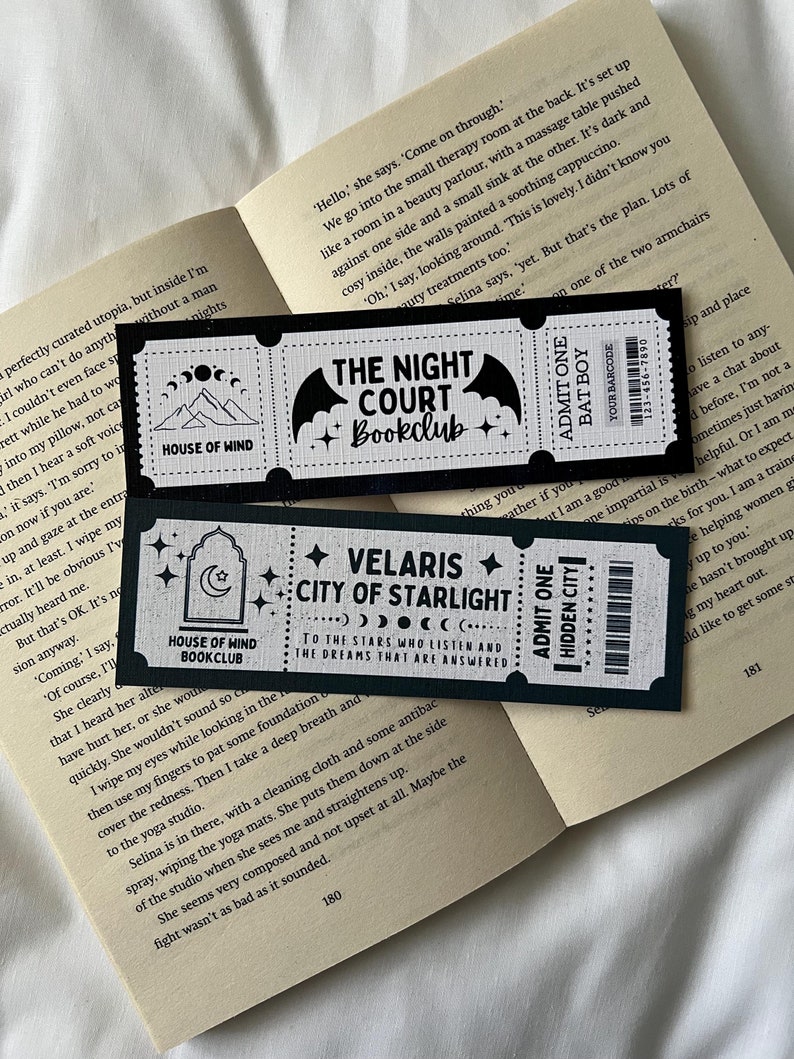 May include: Two black and white bookmarks with a gothic aesthetic. The first bookmark features a bat with the text "The Night Court Bookclub". The second bookmark features a crescent moon with the text "Velaris City of Starlight" and "To the stars who listen and the dreams that are answered".