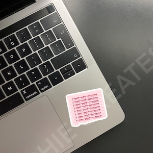 May include: A pink sticky note with the phrase "I am not insane" repeated eight times in a handwritten font.