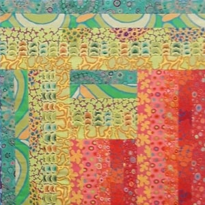 May include: A colorful patchwork quilt with a variety of patterns and colors, including green, yellow, orange, red, and pink.